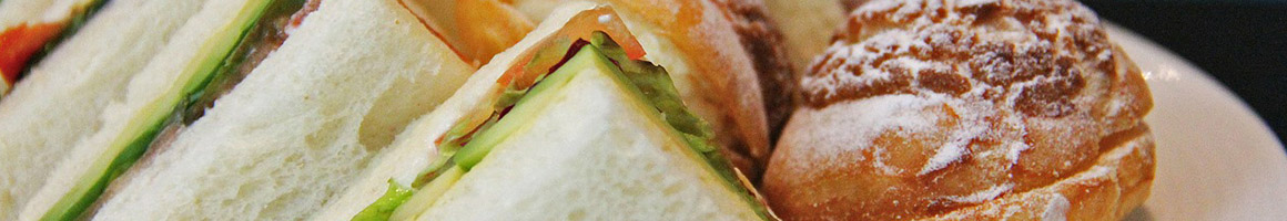 Eating Deli Sandwich at Bono's Cafe restaurant in New York, NY.